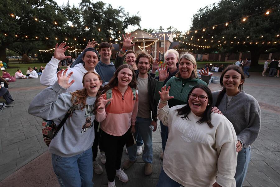 Students and the First Family gather ouside Albritton House at Baylor University
