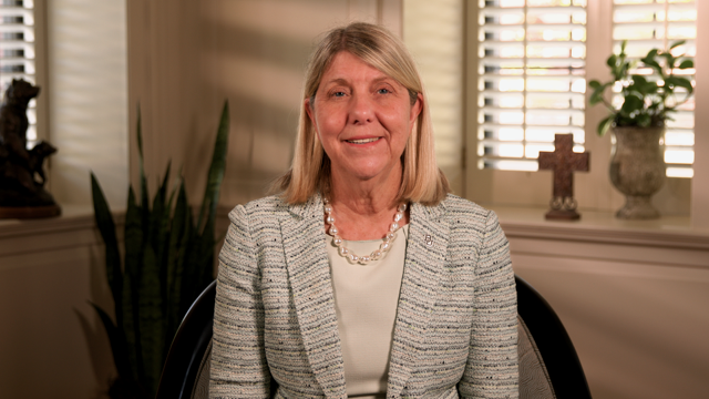 A still photo of Baylor President Linda A. Livingstone delivering an Easter address