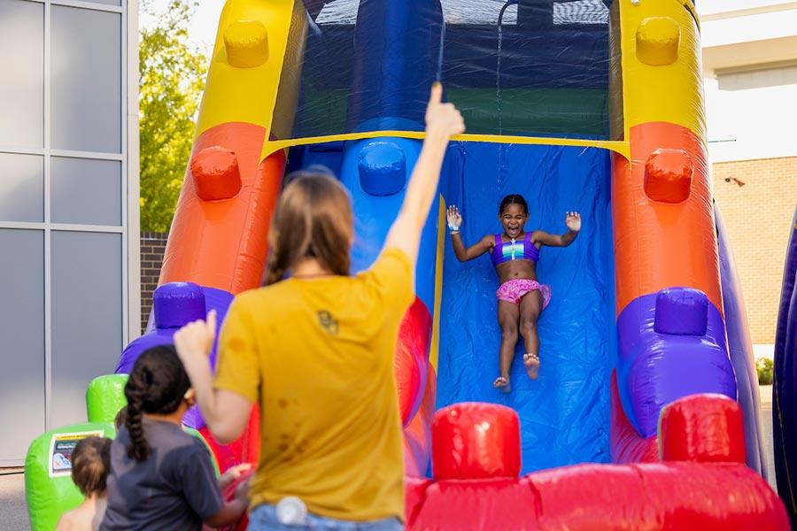 Children playing at Summer on Turner Plaza at Foster Pavilion  